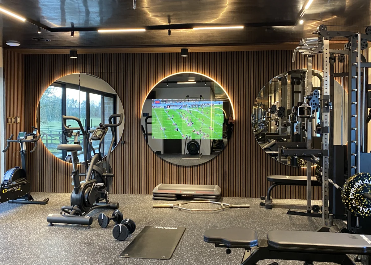Choosing the Right Mirror TV Frame: Foundation vs. Fully Bespoke 5 Circular Gym Mirror TV with LED